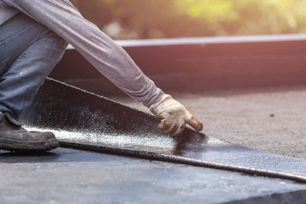 Professional Basement Waterproofing technician working in Olean, NY